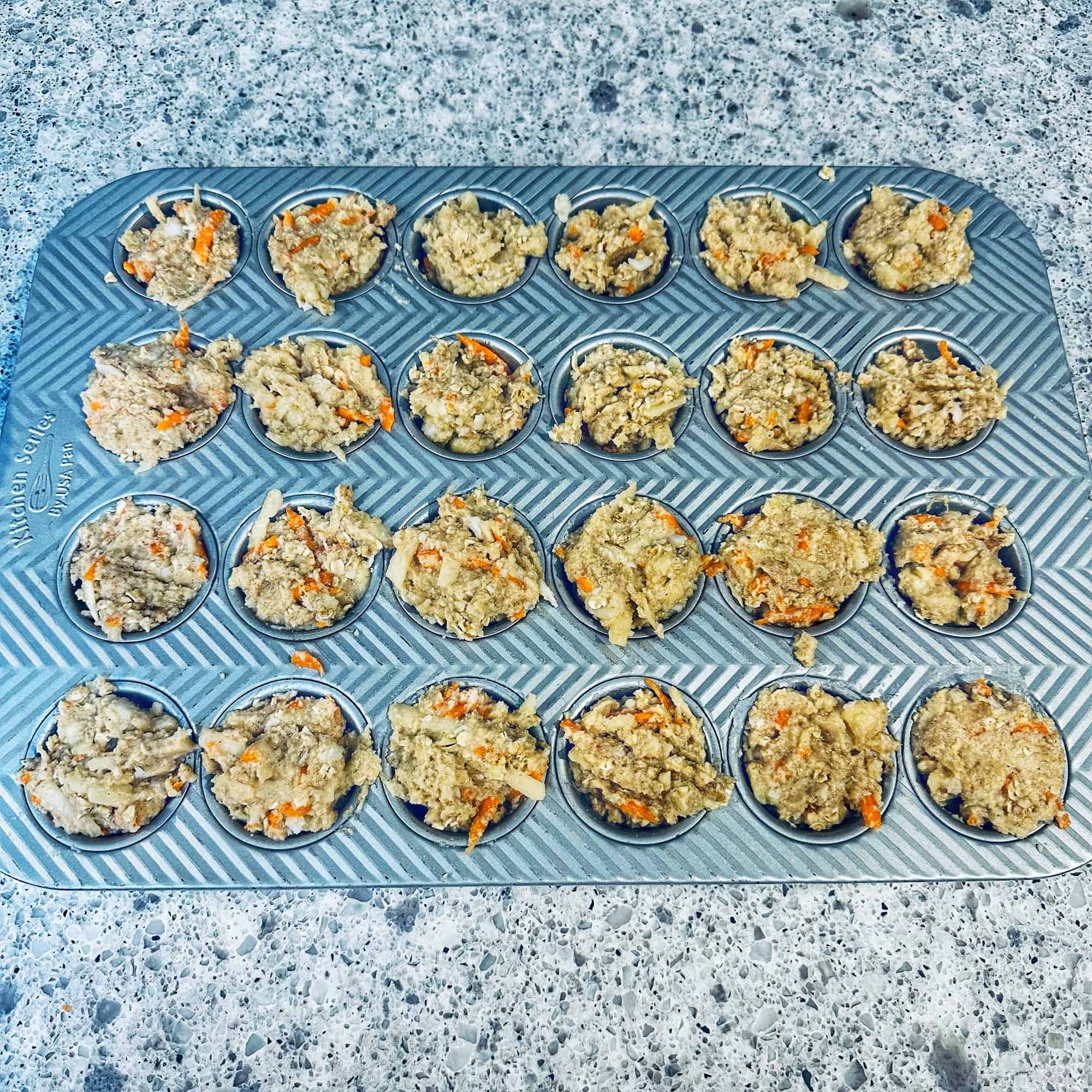 Image of step 4 for ABC muffins with muffin dough in a mini muffin pan.