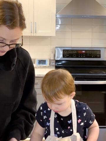 Picture of parent and child making food together