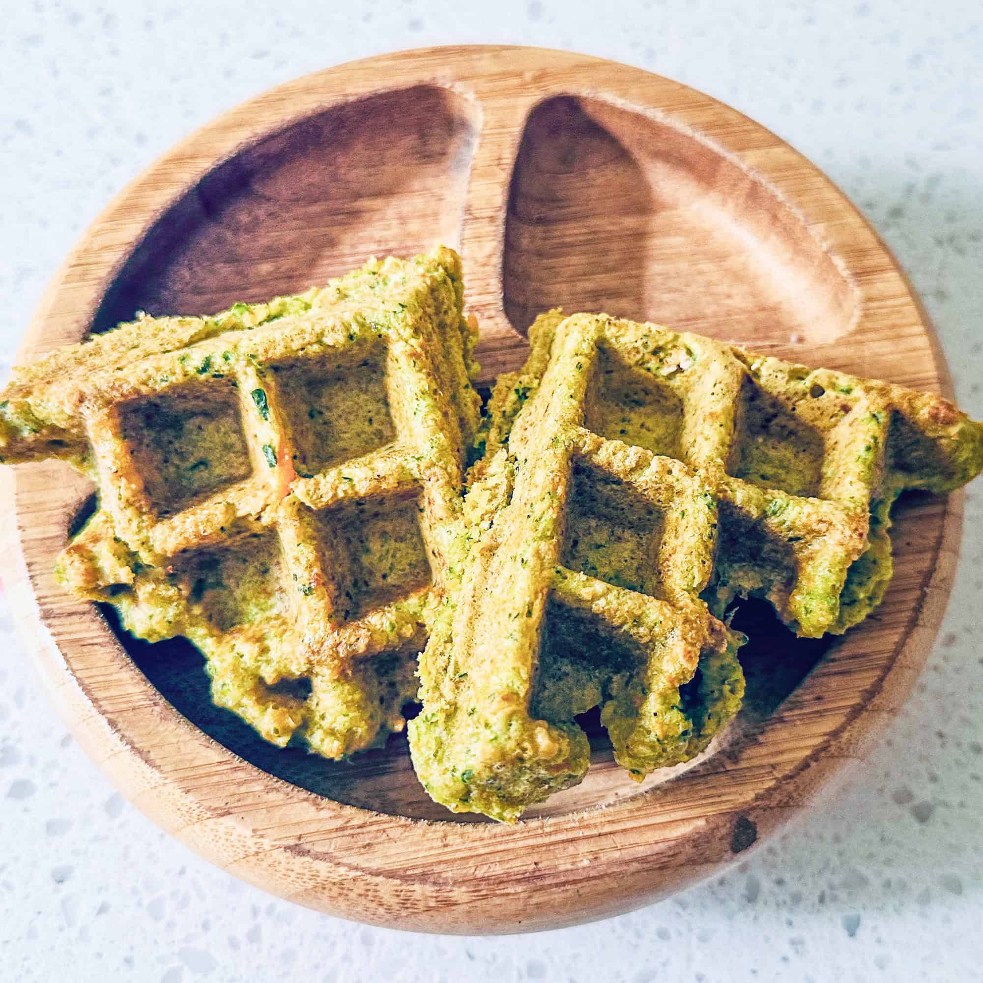 Image of savoury waffles in wooden toddler bowl