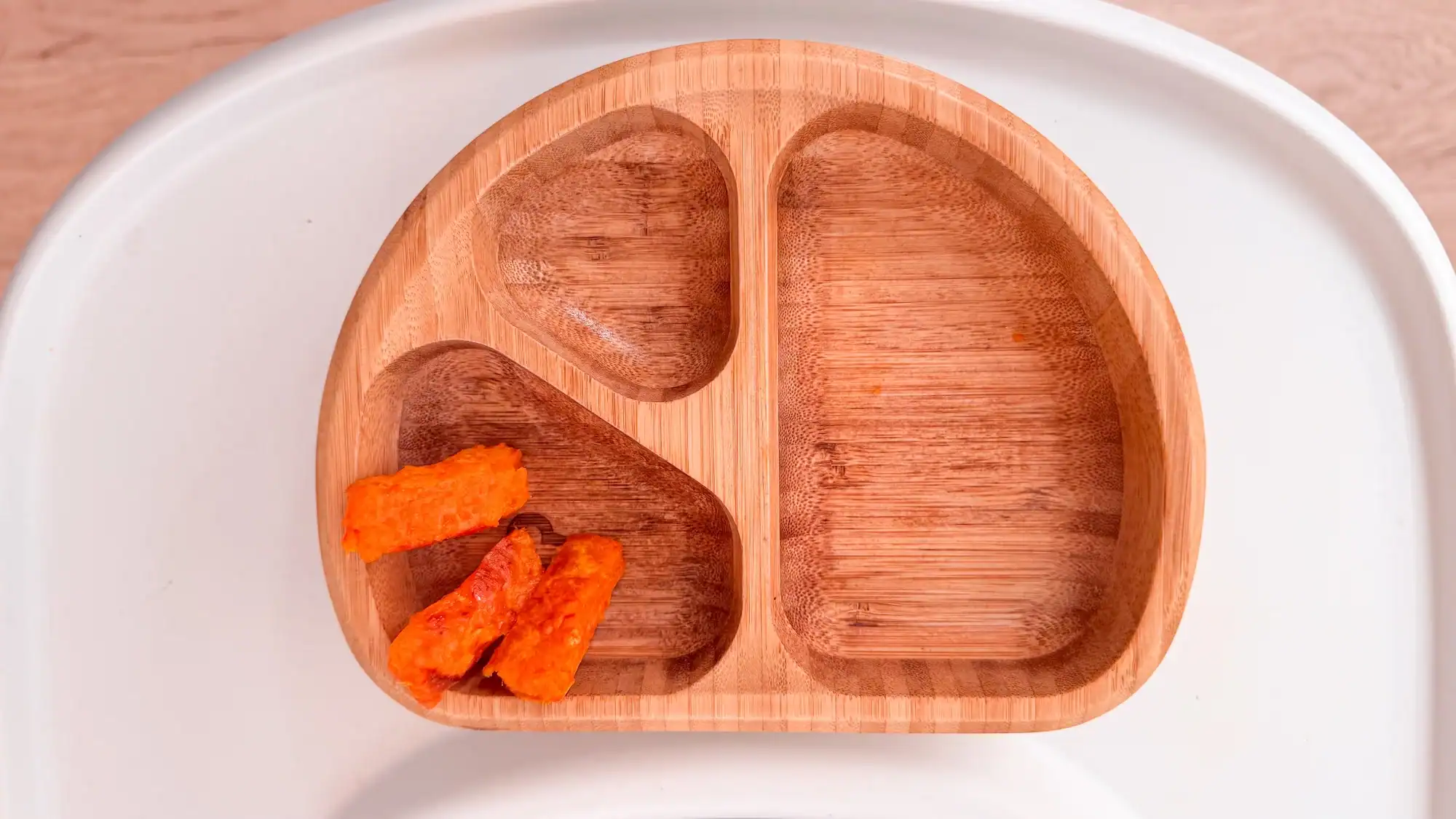 Sweet potato strips in wooden baby on baby tray.